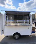 Ready To Roll Custom Mobile Food Truck Trailer With Commercial Kitchen Stainless Sink Refrigerator And Secure Storage For Zero Hassle Street Catering Operations, rear view with open serving area.