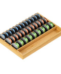 Bamboo Coffee Pod Drawer Organizer For Nespresso Vertuo Vertuoline Pods filled with capsules in a natural bamboo finish.