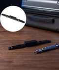 Black Plastic Luggage Repair Button For Telescopic Suitcase Handles Universal Pull Rod Grip Replacement on wooden surface.