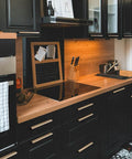 Modern kitchen with black cabinets featuring Six Pack Of 5 Inch Champagne Bronze Knurled Cabinet Pulls For Drawers And Dressers