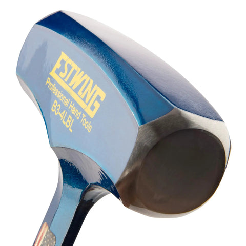 Close-up of Big Blue 4 Pound Drilling Hammer With Long Handle Built Like a Tank Forged Steel Construction, angled view.