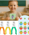 Child holding craft card with grape design; Three Piece Hole Punch Set With Round Heart And Star Shapes For One Quarter Inch And Three Sixteenth Inch Holes.