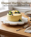 10 Inch Scalloped Marble Lazy Susan Hella Smooth Spinning Kitchen Turntable For Spices Oils And Condiments, showcasing a cake with blueberries.