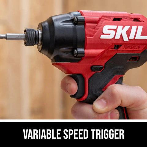 Close-up of 20 Volt Brushless Cordless Impact Driver Kit Including Quick Charge Battery, showing variable speed trigger and quarter inch hex collet.