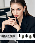 Model with Semi Cured Gel Nail Strips And Wraps 20 Piece Kit For DIY Manicure With UV LED Lamp required, trendy black design.