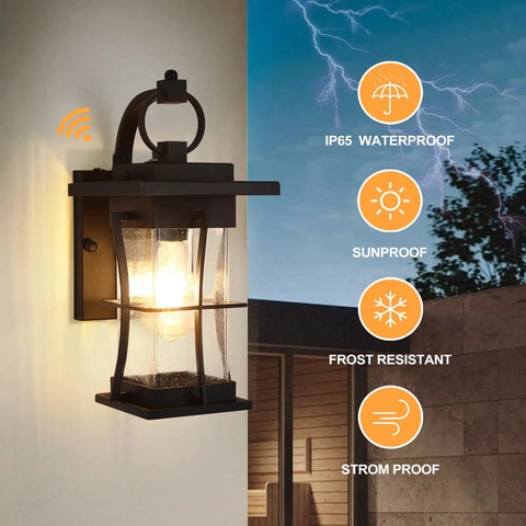 Dusk To Dawn Outdoor Wall Lantern With Sensor, Matte Black Porch Light, shown lit on house exterior with weatherproof features