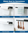 Under Cabinet Paper Towel Holder For Kitchen And Bathroom Wall Mounted Matte Black SUS304 Stainless Steel Roll Rack shown holding paper towel, towel, plastic wrap, utensils