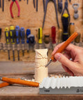Wood Carving Sharpener 1000 Grit Whetstone With Extra Grooves For Chisels And Gouges in a woodworking workshop.