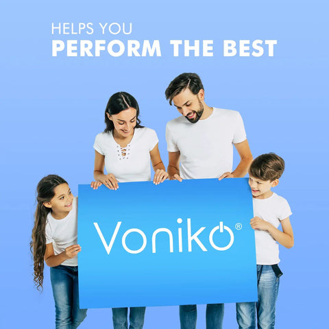 Family of four smiling while holding a large blue sign with the text "Voniko" in front of a light blue background.