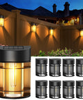 8 Pack Solar Fence Lights With Dusk To Dawn Sensor illuminating a wooden fence and porch area at night, warm 3000K glow