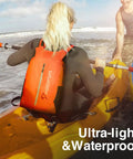 Woman kayaking with Floating Waterproof Dry Backpack With Waist Pouch And Phone Case 20L Orange Must Have Gear For Kayaking Camping Beach Boating And Swimming Lightweight Outdoor Gear For Men And Women