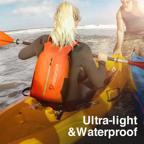 Woman kayaking with Floating Waterproof Dry Backpack With Waist Pouch And Phone Case 20L Orange Must Have Gear For Kayaking Camping Beach Boating And Swimming Lightweight Outdoor Gear For Men And Women