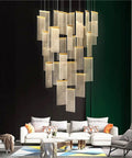 Modern Staircase Chandeliers Led Pendant Light for High Ceiling,Residence above a white sofa in a stylish living room.