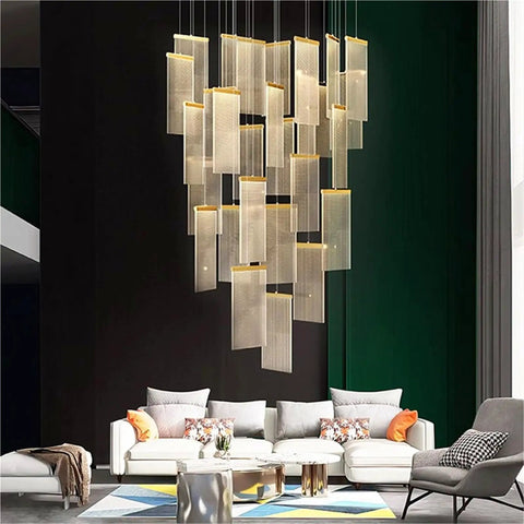 Modern Staircase Chandeliers Led Pendant Light for High Ceiling,Residence above a white sofa in a stylish living room.