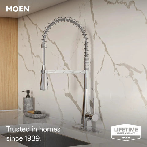 Moen Swyre Spring Pulldown Kitchen Faucet, 87538 with high arc spout and pullout wand, chrome finish on modern kitchen counter.