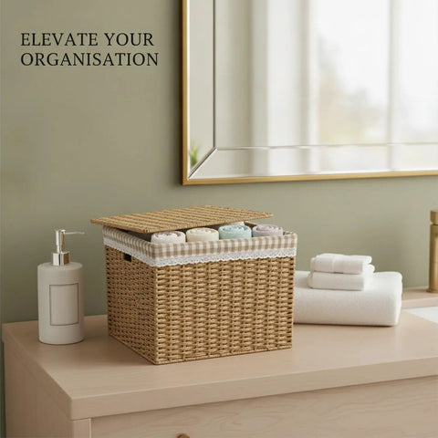 Slick Heavy Duty Flip Top Storage Bin For Closets And Bathroom Vanities To Dodge Dust And Keep Dailies Nice And Tidy With Secure Lid displayed on dresser with towels.