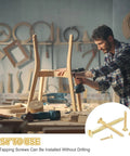 Man using Brass Slotted Flat Head Wood Screws M4 x 30mm Self-Tapping For Indoor Furniture Appliances And Woodworking No-Fuss Quick Fix For Cabinets DIY Projects Fences And Home Improvement Pack Of 12 on wooden chair in workshop.