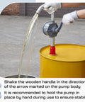 Heavy Duty Two Pack Manual Drum Pump For 55 Gallon Barrels And 15 To 55 Gallon Tanks in use transferring liquid from yellow barrel.