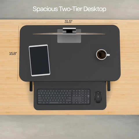 Top view of the Height Adjustable 32 Inch Desk Converter with keyboard tray and items, showcasing dual monitor riser for home office.