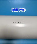 Diamond drill bit set packaging on white surface with small holes; blue Drill PVC label visible in background.