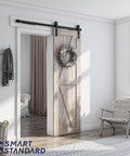 Sliding Barn Door Hardware Kit With Soft Close For 5 To 10 Ft Doors, installed in minimalist living room, J Shape track