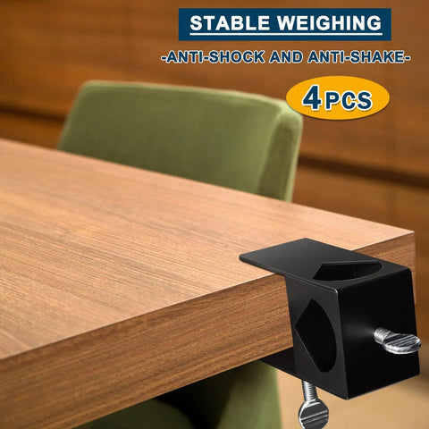 4 Pack Metal Black Deck Clamp For Torches And Railings, heavy duty mount attached to a table edge, anti-shock feature visible.