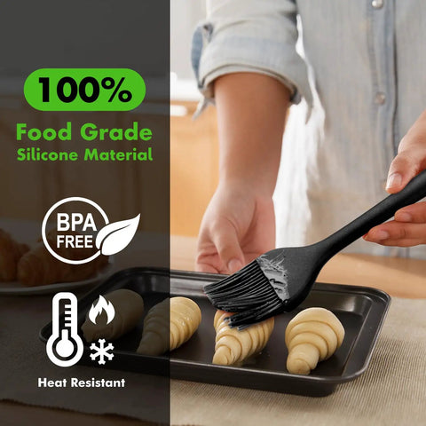Person using 600 Degree Fahrenheit Heat Resistant Silicone Basting Brush Set for baking croissants, BPA free, stainless steel core