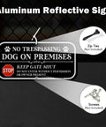 Badass Yard Setup 12 X 6 Inch No Trespassing Dog On Premises Sign 2 Pack Heavy Aluminum Fence Lockdown Plaque displayed with zip ties and screws