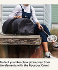 Roccbox Portable Pizza Oven Cover Made With 900D Waterproof Fabric For All Weather Outdoor Use Heavy Duty Transport Strap In Use