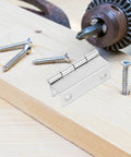 Right Angle Cabinet Door Hinges 10 Pack With Screws 180 Degree Full Overlay Heavy Duty Iron Hinges on wood surface with screws