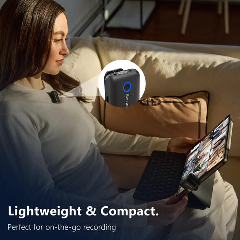 Woman using 2-Person Wireless Lavalier Microphone System For iPhone, Cam, And Android with 40 Hour Battery Life while on tablet