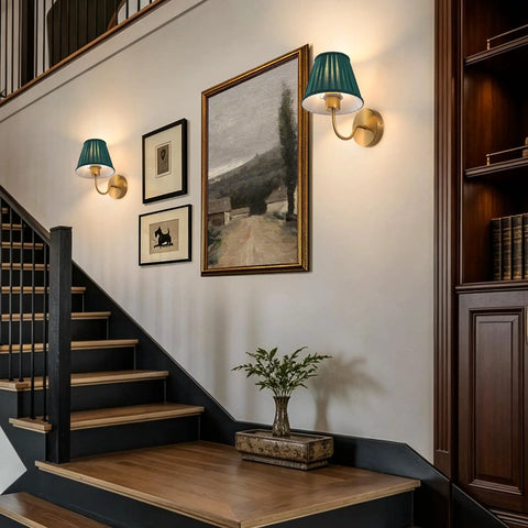 EIDISUNY Battery Operated Wall Sconces, Rattan Wall Sconce Set of 2 with RGB Rechargeable Dimmable Bulbs, Gold Wireless Wall Sconce with Remote for Bedroom, Living Room, Hallway illuminating a staircase.
