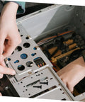 Person installing a fan mount inside a PC case using Twenty Piece Rock Solid Anti Vibration Fan Dampener Pins For PC Case Rig Setup Ultra Quiet Shock Absorbing Mount Hardware For Chill Cooling Builds.