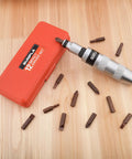 Industrial-Grade 14-Piece Impact Screwdriver Set With 40CR Alloy Steel Bits, Manual Impact Driver and case on wood surface