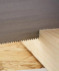 Close-up of a saw blade cutting wood at a 90-degree angle, demonstrating the Saw Storage Miter Box With Saw Aluminum Construction All In One 11.81 Inch Length With 90 Degree 45 Degree And 22.5 Degree Slots Patented Storage System Built For Quick Setup And Accurate Cuts.