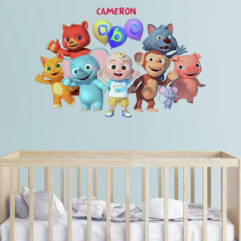 Cocomelon Giant Peel And Stick Wall Decals With Alphabet, 134 Piece Set For Kids Room Decor above a crib.