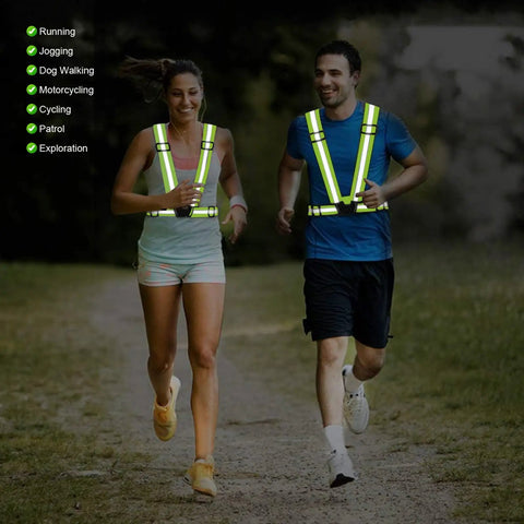 Two people jogging outdoors wearing Reflective Running Vest 2 Pack High Visibility Gear For Cycling Jogging Walking Adjustable Safety Vests.