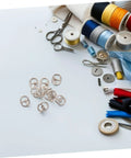 150 Pcs Miniature Alloy Buckles For Doll Clothes Shoes Belts Quick Release Metal Fasteners for Sewing Projects with sewing tools.