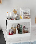 Four Tier Rolling Cart On Wheels With Three Hanging Baskets Easy Assembly Craft Art Trolley Organizer holding kitchen supplies on countertop