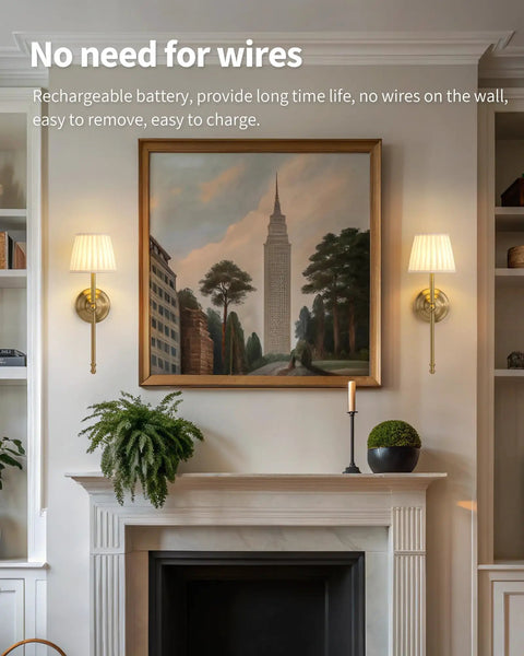 Legit Dope Gold Cordless Wall Sconces Set Of Two With Soft Beige Fabric and Warm LED lighting near a painting above a fireplace.