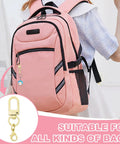 Top Notch Double Head Lobster Claw Clasps Featuring Smooth Swivel Snap Hooks And Sweet Multi Color Collections attached to pink backpack.