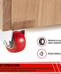 Pro Build 0.9 Inch Red Rubber Caster Wheels 2 Pack Swivel Furniture Casters with rust-resistant galvanized brackets on a wooden surface.