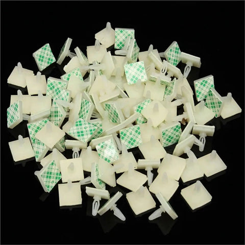 High Tack Adhesive PCB Standoffs With Snap Lock Posts For Circuit Boards Killer Grip Stick On Spacers pile of heavy-duty nylon standoffs.