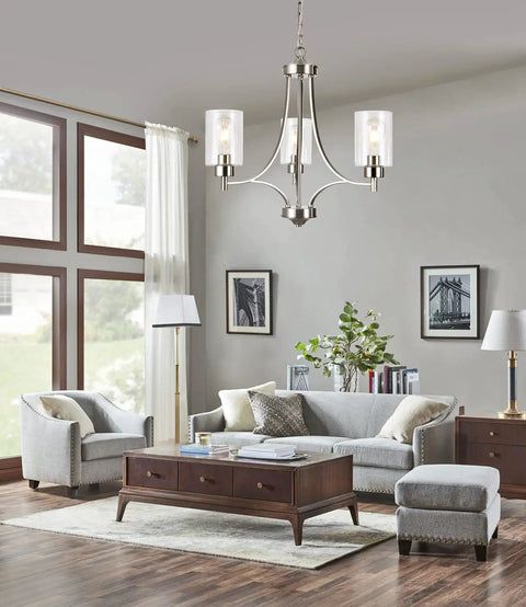 Dope 3 Light Modern Chandelier in Brushed Nickel with Clear Glass Shades hanging in a contemporary living room setup