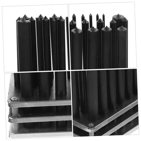 Close-up of Ergonomic Transfer Punch Set 28 Pieces For Mechanics with black punches on stacked steel plates.