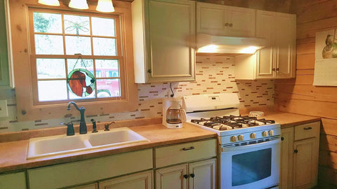 10 Sheet Peel And Stick Backsplash Subway Tile In Copper Beige Marble Look For Kitchen And Bathroom behind stove in a kitchen setting