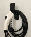Heavy Duty Wall Mount EV Charger Cord Holder And Charging Station Cable Organizer Hook For SAE J1772 Plug attached to wall