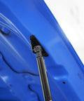 Close-up of Hood Quicklift System Maxlift Plus for Tacoma 2016 2023 fits stock and aftermarket hoods raises hood seven