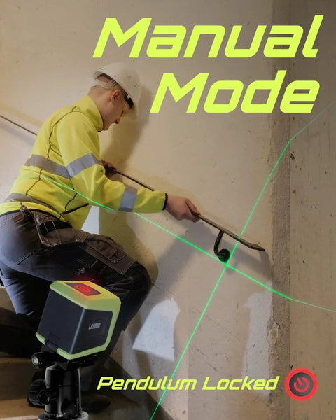 Worker using Self Leveling Green Laser Level With Cross Lines For Picture Hanging And Construction on wall in manual mode.