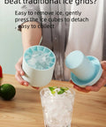 Person using 3D Upgraded Silicone Ice Cube Tray With Easy Release For Fast Ice 30 Cubes, Leak Proof And Space Saving Freezer Organizer, BPA Free.